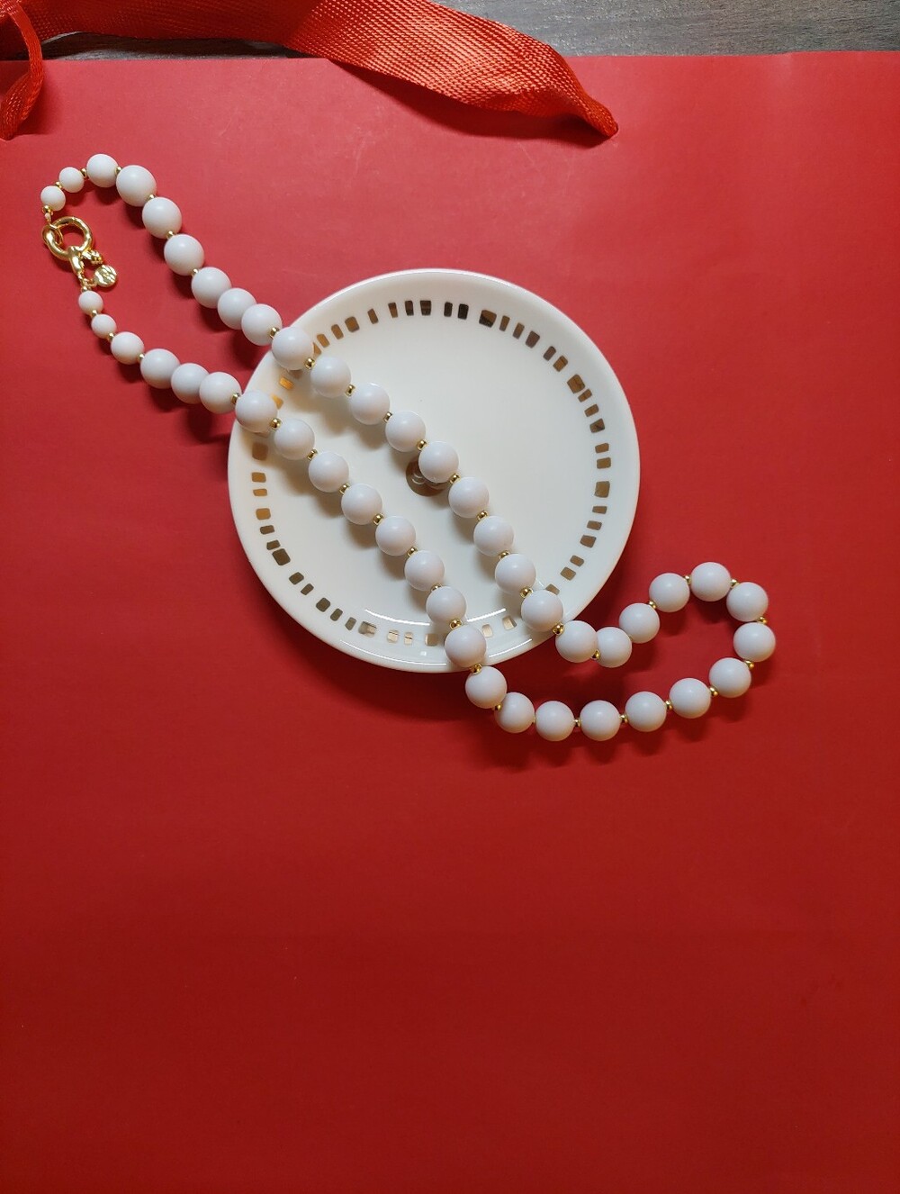 Gorjana Iris Elegant White Beaded Necklace with Gold Accents and Jewelry Tray.